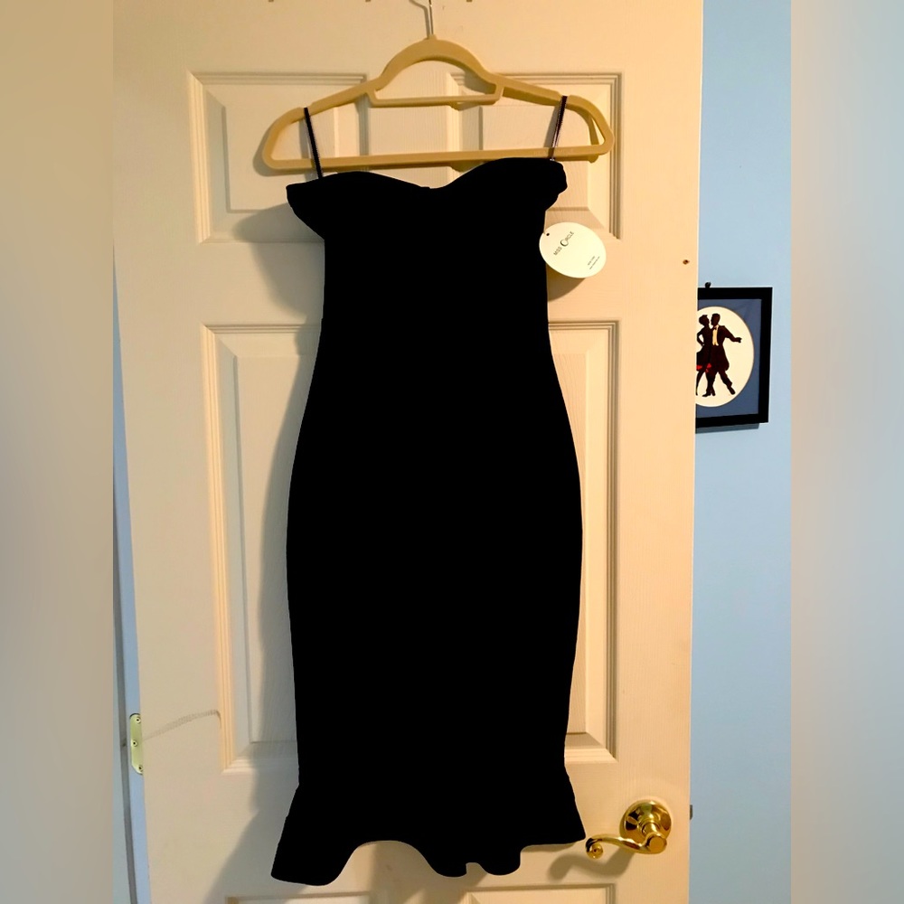 Miss Circle knee length dress. Brand New! Designed in Soho New York.